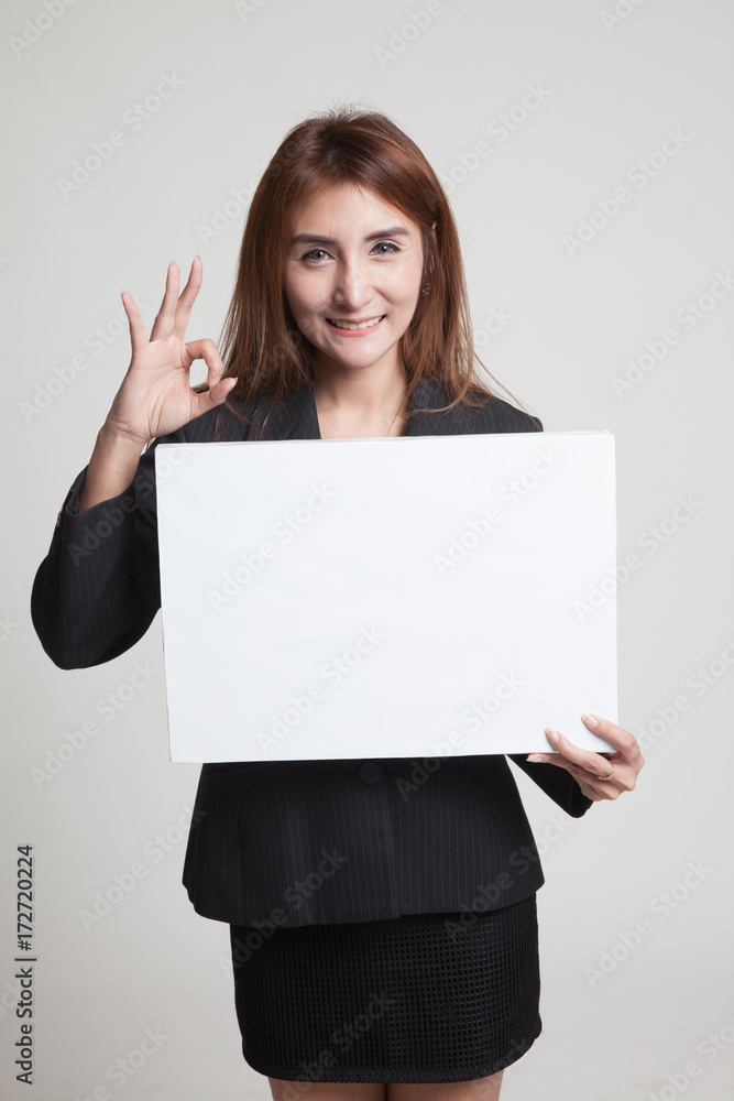 Young Asian woman show OK with white blank sign. Young Asian woman show OK with white blank sign.