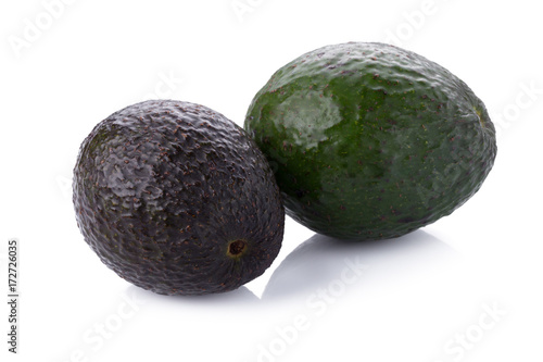 Green ripe avocado isolated on the white background