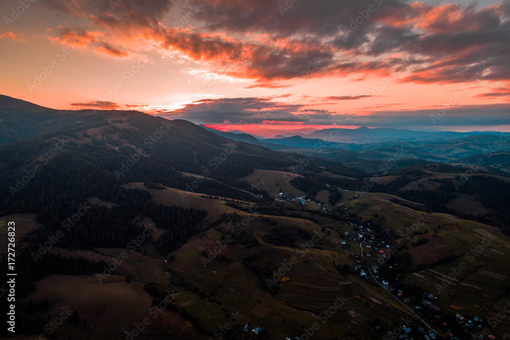 Aerial view of the village in the Carpathian mountains on the Sunset