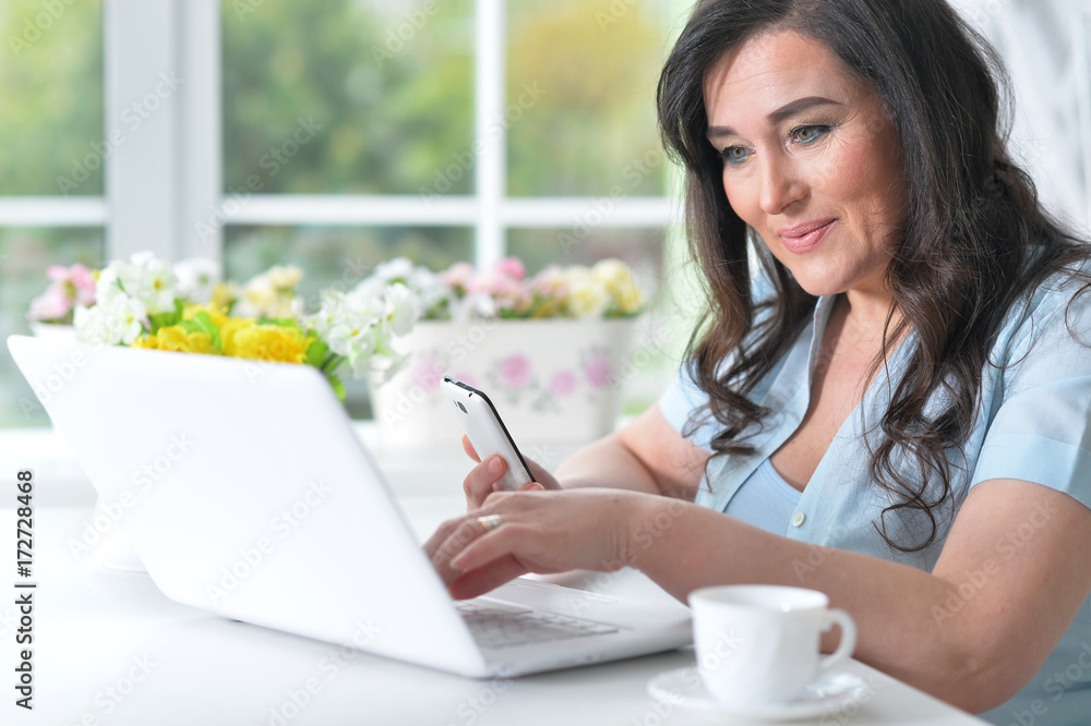 Mature woman with a laptop Mature woman with a laptop