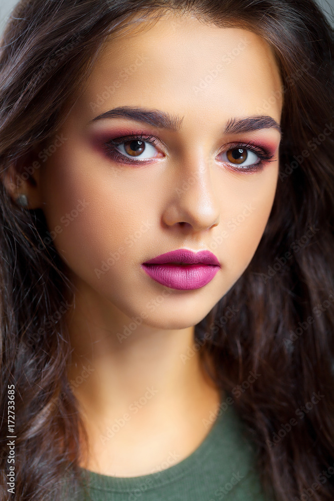 Close-up of a Young Woman Getting Spa Treatment. Cosmetic Cream on a Cheek. Skin Care