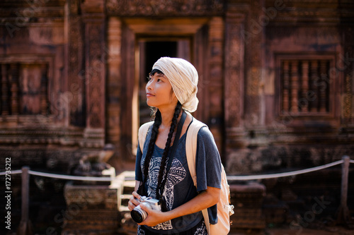 Female traveller at Banteay Srei temple in Siem Reap (Cambodia) photo