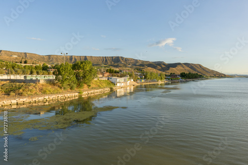 The river Ebro on its way through Mequinenza, Aragon © vicenfoto