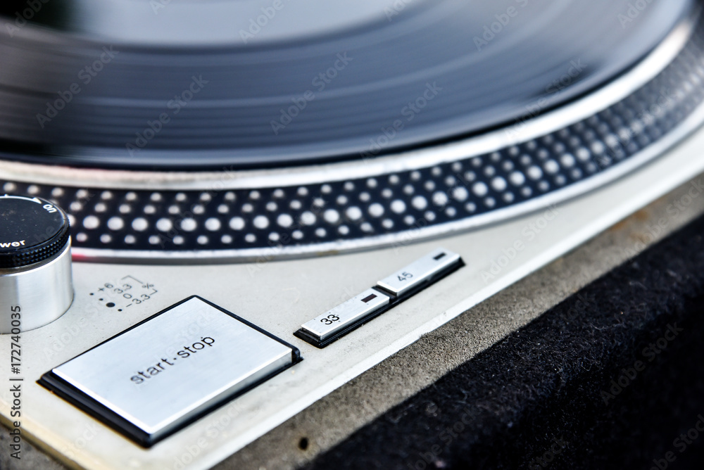 Detail of an old player and vinyl phonograph record Detail of an old player and vinyl phonograph record