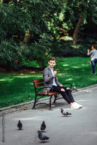 Man sitting on the park background