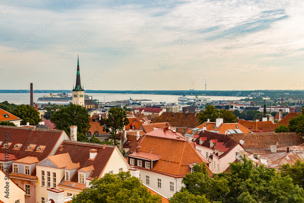 Aerial view of Tallinn Old Town, seaport and cruise ships in a beautiful summer morning, Estonia