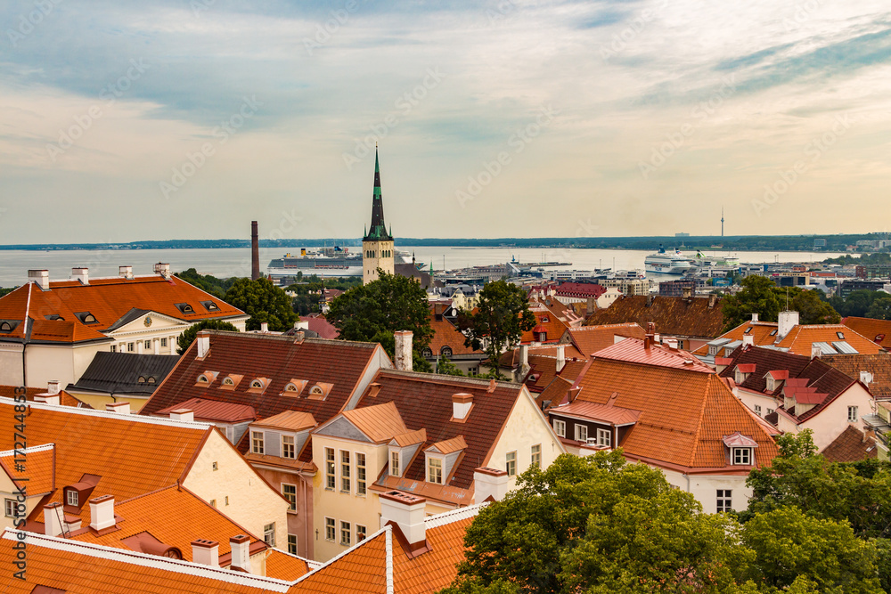 Aerial view of Tallinn Old Town, seaport and cruise ships in a beautiful summer morning, Estonia