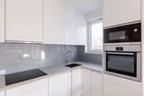 Modern kitchen with white cupboards