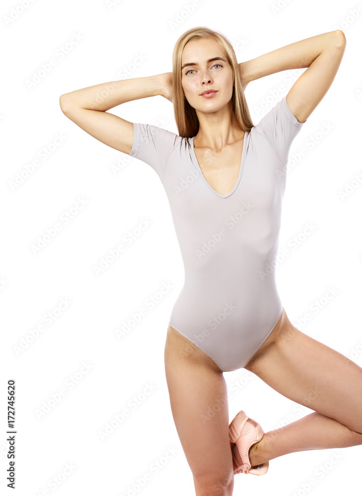 Young beautiful blonde woman in fitness clothing