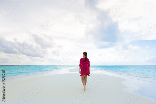 Woman walking on Sandbank