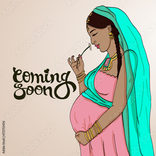 indian pregnant woman in pregnancy dress is prepared for maternity