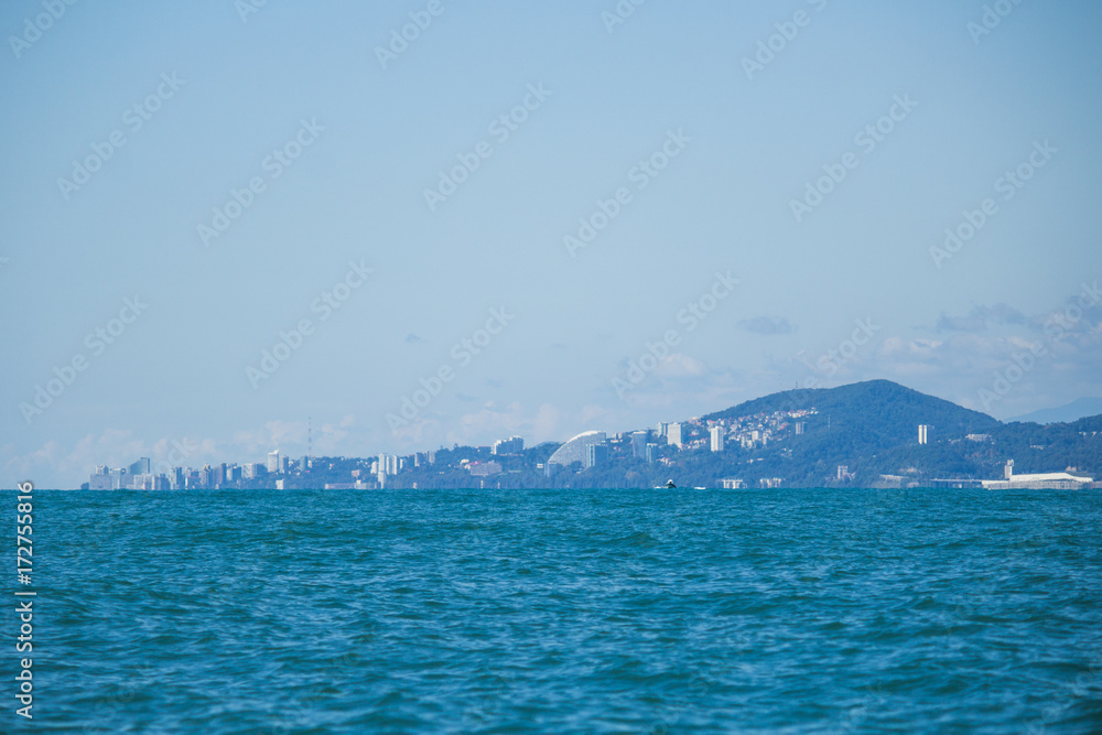 Panoramic view from the sea to the city and mountains