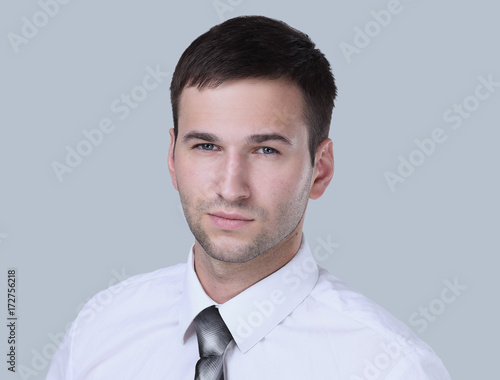 Closeup portrait of a confident handsome businessman