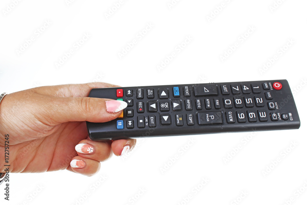 Woman hand holding remote control on isolated white cutout background. Studio photo with studio lighting easy to use for every concept. Woman hand holding remote control on isolated white cutout background. Studio photo with studio lighting easy to use for every concept.