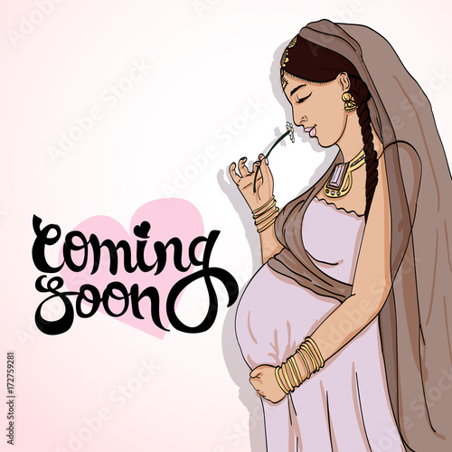 indian pregnant woman in pregnancy dress is prepared for maternity