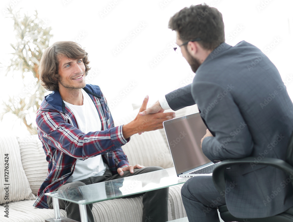 Fototapeta premium manager shakes hands with his client