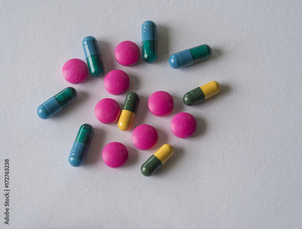 colorful blue green yellow and pink pills pain killers and antibiotic capsule colorful blue green yellow and pink pills pain killers and antibiotic capsule