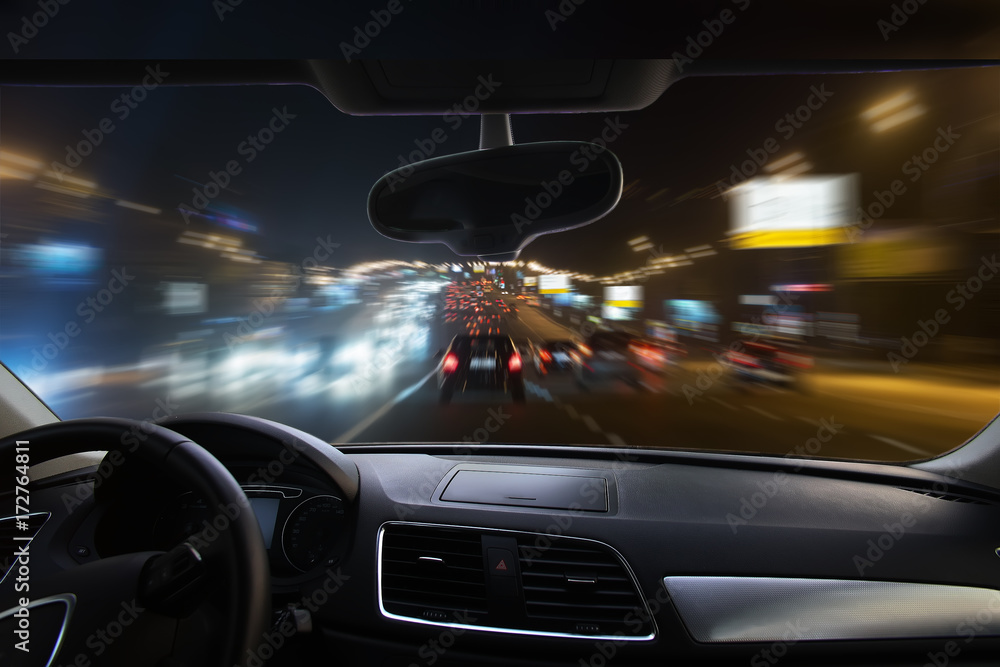 car moving on highway at night