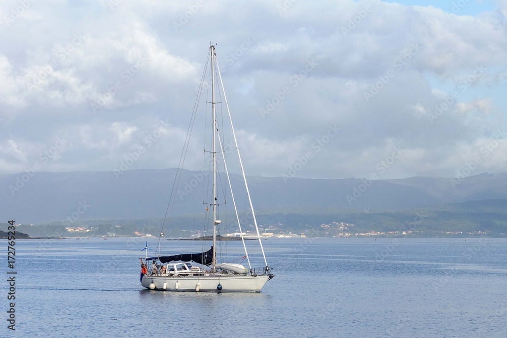 sailing yacht at the port entrance sailing yacht at the port entrance