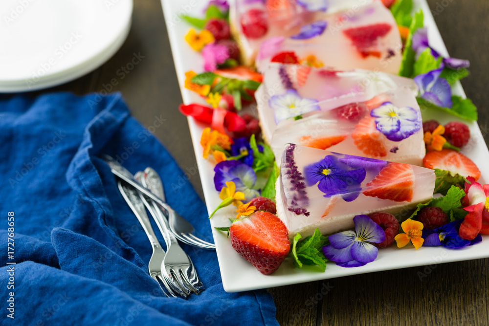Horizontal shot of edible flower jelly slice dessert Stock Photo