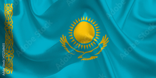 Waving flag of the Kazakhstan. Flag in the Wind. National mark. Waving Kazakhstan Flag. Kazakhstan Flag Flowing. photo