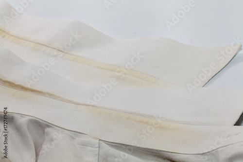 stain of the dirty white shirt