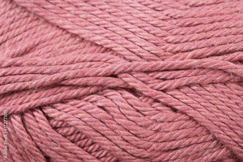 A super close up image of rose yarn