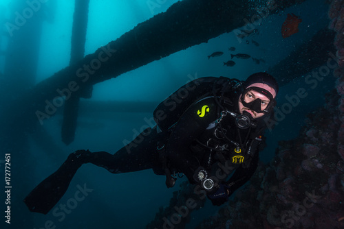 Diver under the Eureka Oil Rig Structure