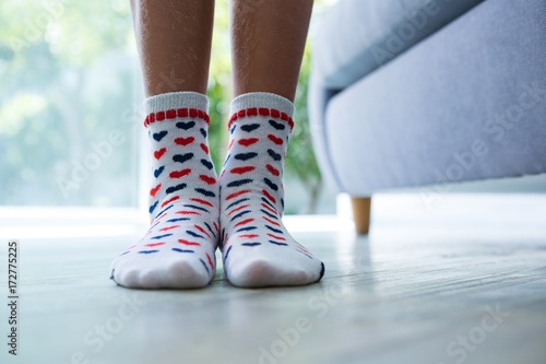 Low section of girl wearing socks