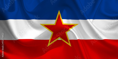 Waving flag of the Yugoslavia. Yugoslav Flag in the Wind. National mark. Waving Yugoslavia Flag. Yugoslavia Flag Flowing.