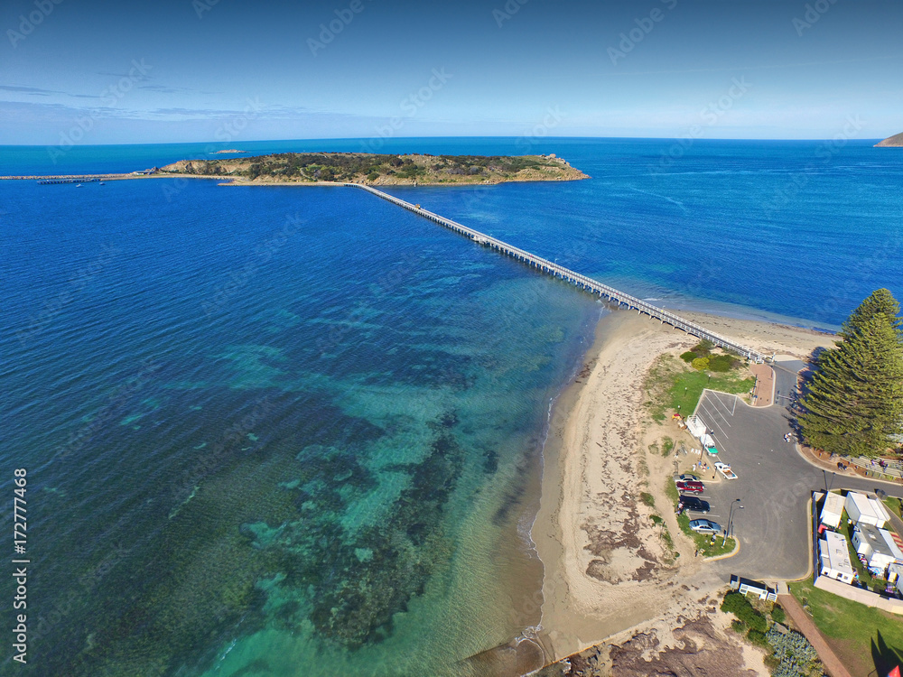 Granite Island causeway jetty at Victor Harbor (Harbour) South Australian Tourism Holiday Hot Spot, featuring horse drawn carriage cart wagon and calm water blue bay scenes