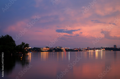 Amazing colors after sunset sky nature background. Madison skyline as seen from a pier in the Tenney Park, Midwest USA, Wisconsin.