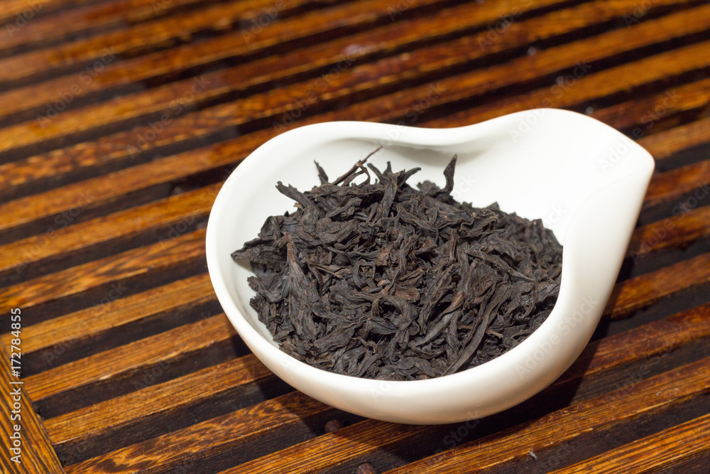 Chahe with black tea for Chinese tea drinking on the table. Traditional Chinese tea drinking ceremony. Chahe with black tea for Chinese tea drinking on the table. Traditional Chinese tea drinking ceremony.