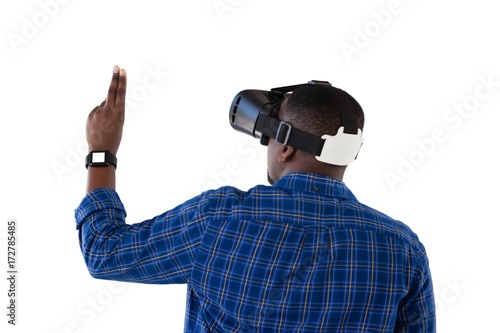 Man gesturing while using virtual reality headset