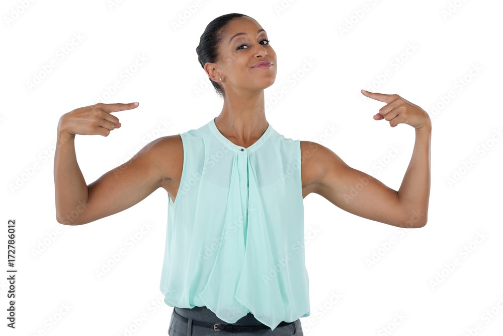 Happy woman pointing at herself Happy woman pointing at herself