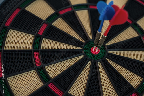 Two darts on a dart board