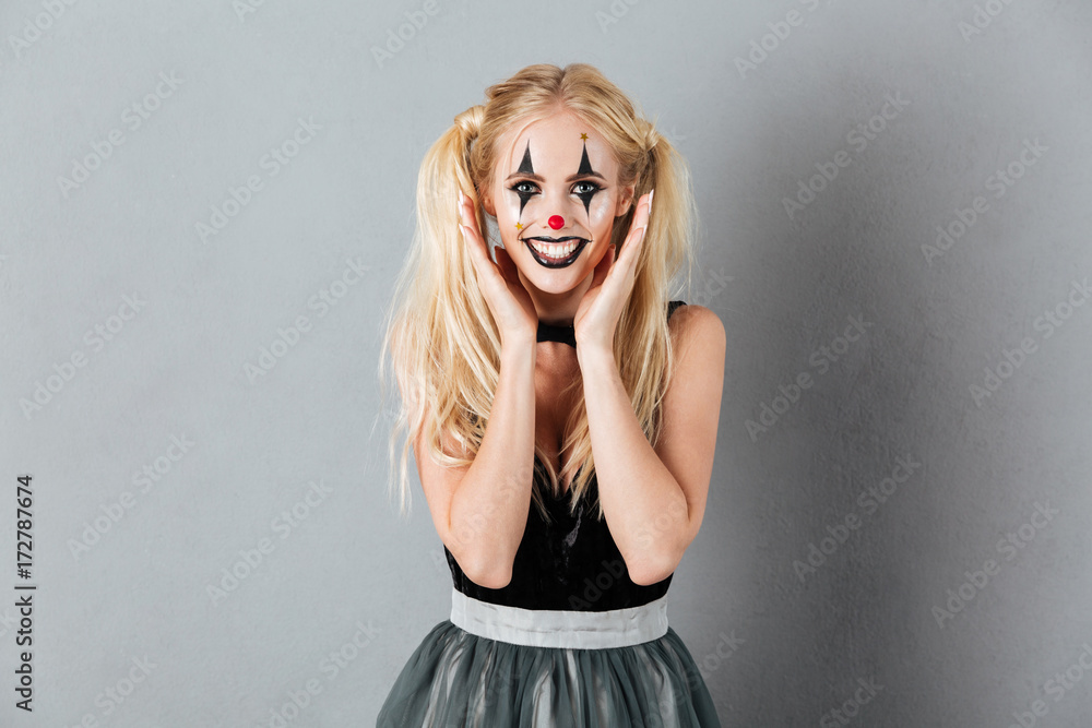 Portrait of a happy blonde woman in halloween clown make-up Stock Photo |  Adobe Stock
