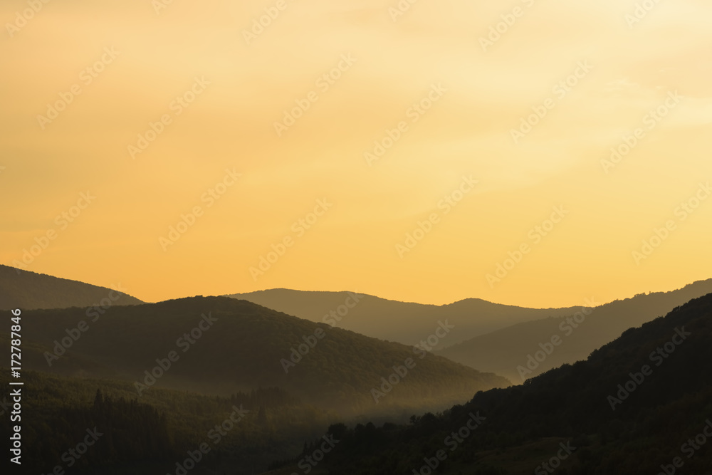 Orange sunset in mountains. Carpathians