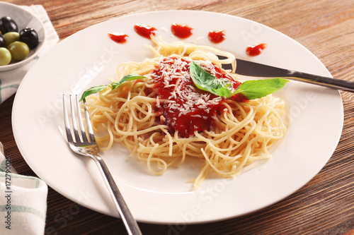 Delicious pasta with tomato sauce on plate