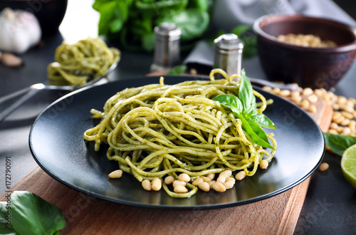 Delicious pasta with pesto sauce on plate