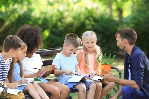 Group of children with teac...