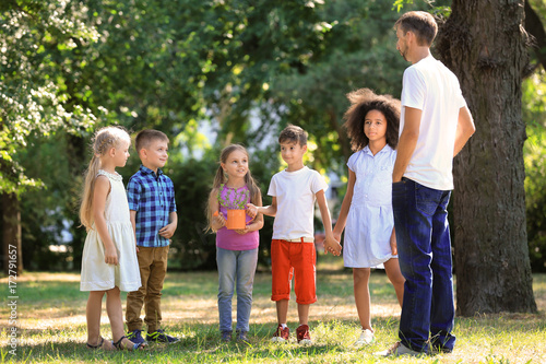 Group of children with teac...