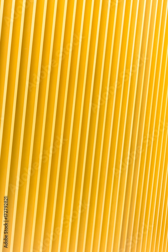 Detail of yellow metal building facade