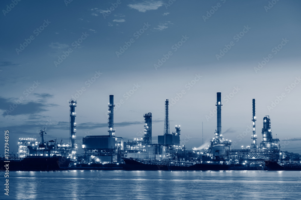 Oil refinery plant and loading dock at twilight, Morning scene
