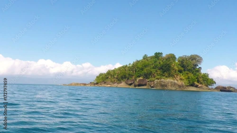 Idylic view of indian ocean with small island, in Masoala national park. Madagascar paradise landscape. Wilderness virgin nature scene Idylic view of indian ocean with small island, in Masoala national park. Madagascar paradise landscape. Wilderness virgin nature scene