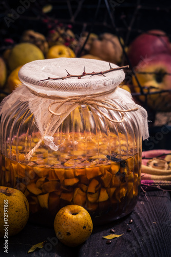 Sliced fruit quince jar covered sugar