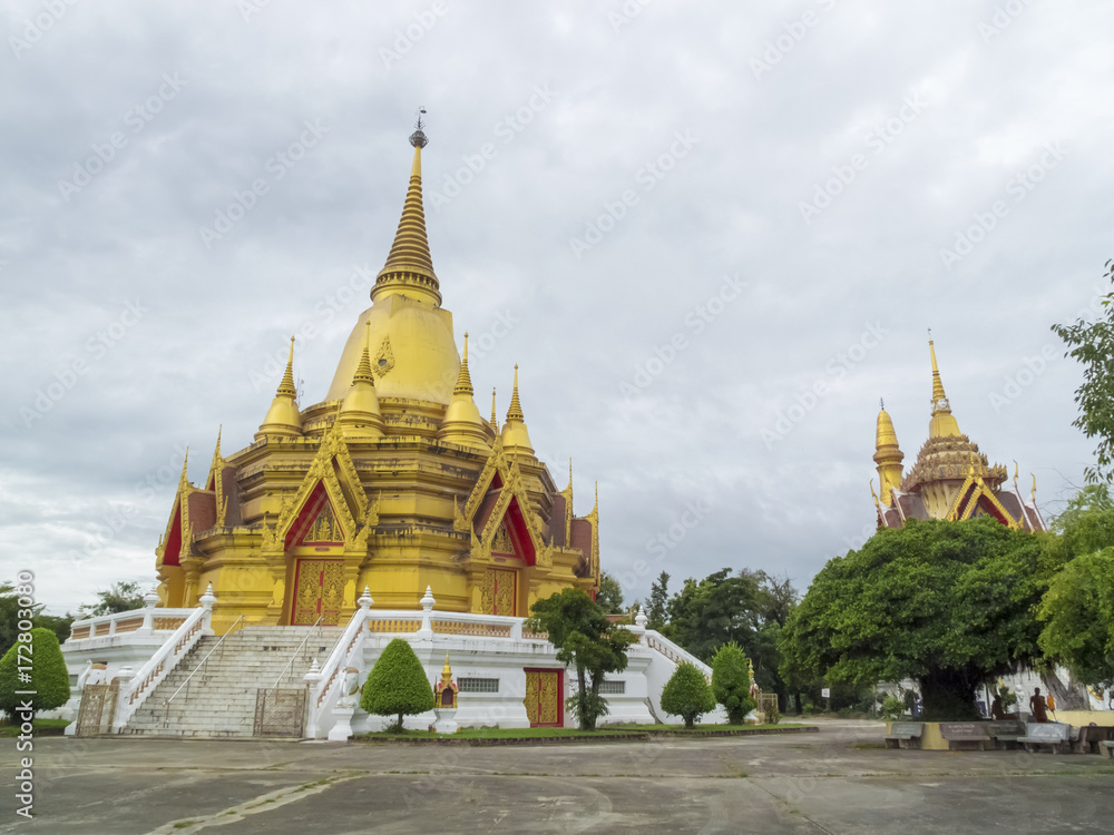 Naklejka premium Golden Pagoda in Ratchaburi Province