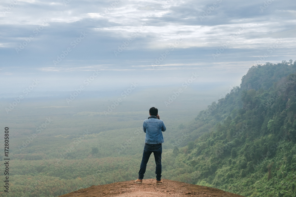 Photographer take a photo on Three rock wale at  Phu Sing, Bungkan, nature as a classroom. Under the supervision of the Department of Forestry