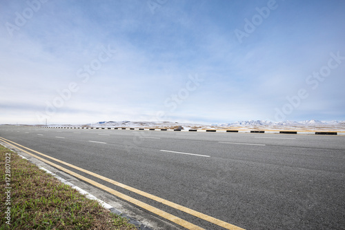 empty asphalt road with beautiful snow mountains