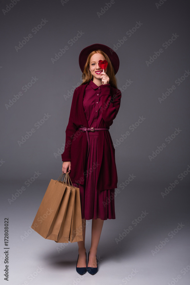 elegant girl with shopping bags